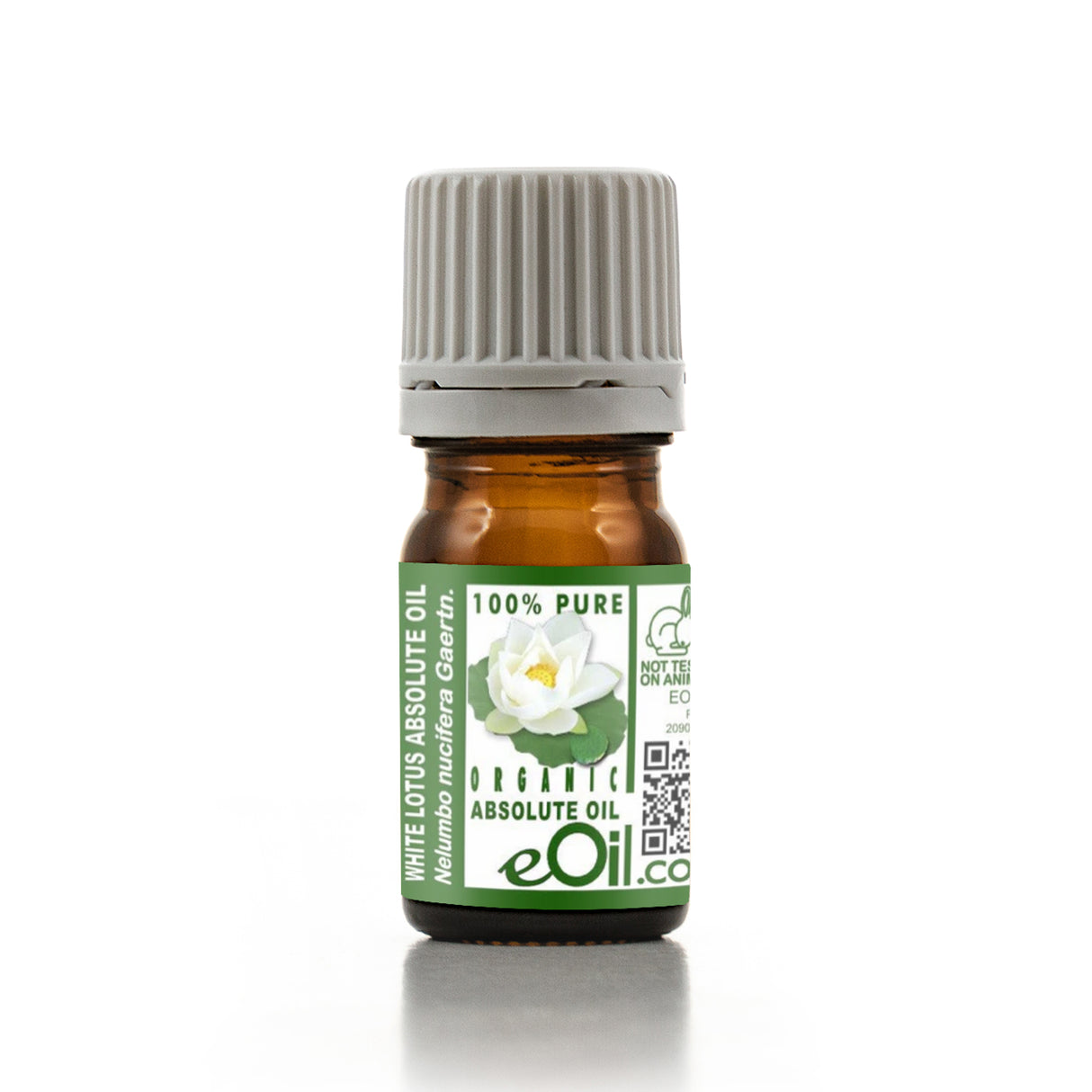 Bottle of White Lotus Absolute Oil with a green label on a white background