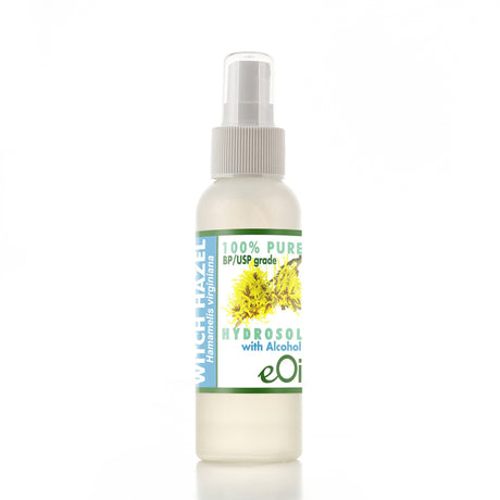 A spray bottle labeled 'WITCH HAZEL HYDROSOL with alcohol' by EOil, indicating 100% pure, 3-grade alcohol-free hydrosol with a label featuring a flower and the brand's logo.