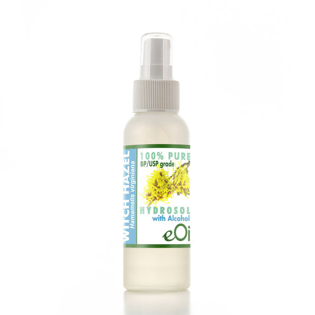 A spray bottle labeled 'WITCH HAZEL HYDROSOL with alcohol' by EOil, indicating 100% pure, 3-grade alcohol-free hydrosol with a label featuring a flower and the brand's logo.