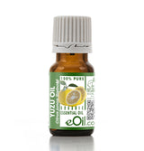 Yuzu oil bottle with green label on a white background