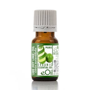 A small amber glass bottle of eOil Co. Lime (Key Lime) Essential Oil with a white ribbed cap and a green label featuring lime illustrations.