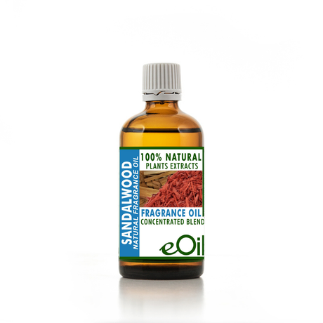 Bottle of sandalwood fragrance oil with a white background